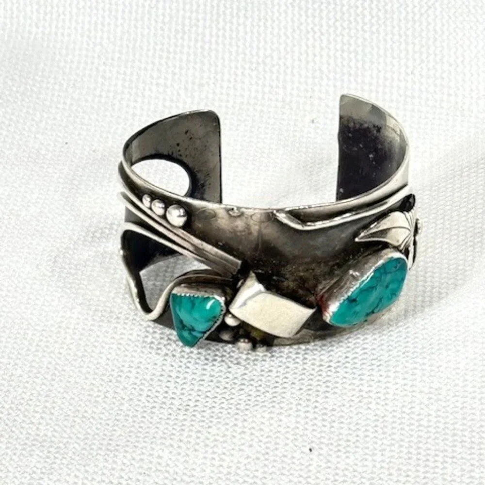 Signed Edison Piaso heavy gauge silver and Sonoran Gold turquoise cuff bracelet.